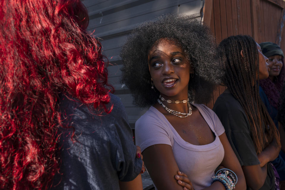 Ruby Beerman, 14, center, of Marin County, Calif., chats with fellow campers who are also Ethiopian adoptees, while attending Camp Be'chol Lashon, a sleepaway camp for Jewish children of color, Friday, July 28, 2023, in Petaluma, Calif., at Walker Creek Ranch. "I get told every day that you're different, you don't belong here, because I'm part of so many different minorities," she said. "And here is kind of a place where everybody belongs to a lot of those minorities. Not everybody is the same here, but we're all different together." (AP Photo/Jacquelyn Martin)