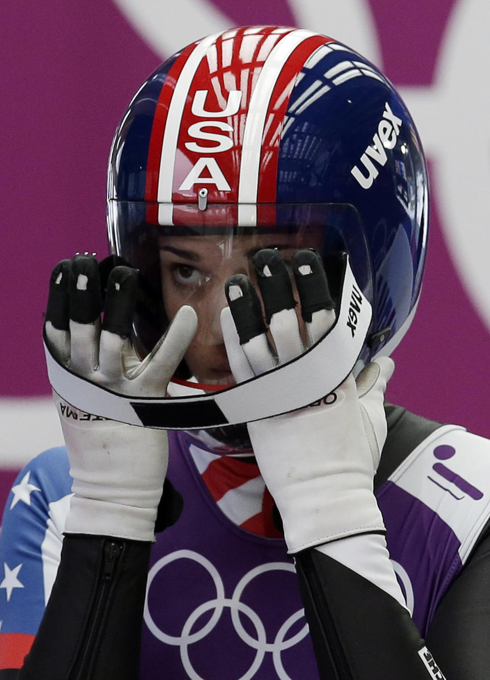 Summer Britcher of the United States prepares to start a run during the women's singles luge training at the 2014 Winter Olympics, Sunday, Feb. 9, 2014, in Krasnaya Polyana, Russia. (AP Photo/Michael Sohn)