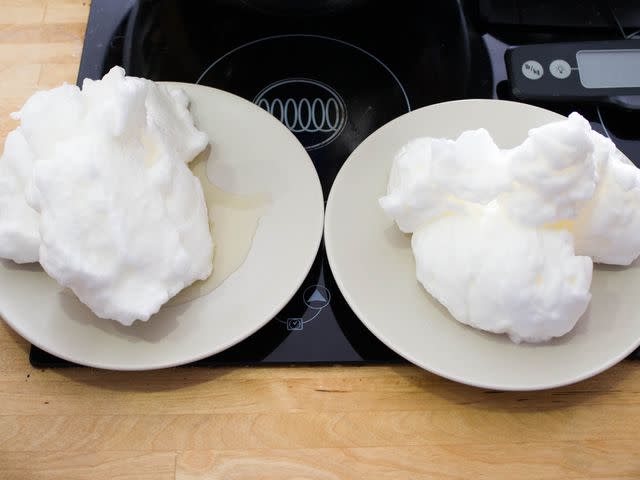 Clean whites at left and whites with one drop of yolk at right, both beaten until very stiff. Sitting side by side, both held their shape for at least an hour. Because they were very stiffly beaten, to the point of being over-beaten, they wept liquid at similar rates as they sat.