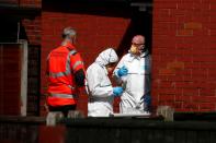 <p>Police investigators work at residential property in south Manchester, Britain on May 23, 2017. (Stefan Wermuth/Reuters) </p>