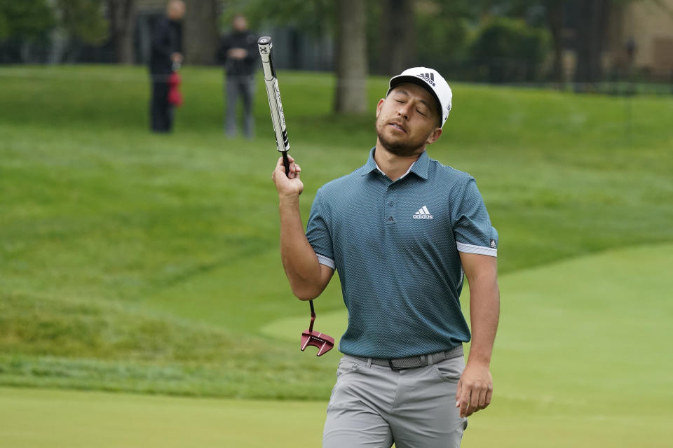 Xander Schauffele reacts after missing a putt on the 13th hole during the first round of the Memorial golf tournament, Thursday, June 3, 2021, in Dublin, Ohio. (AP Photo/Darron Cummings)