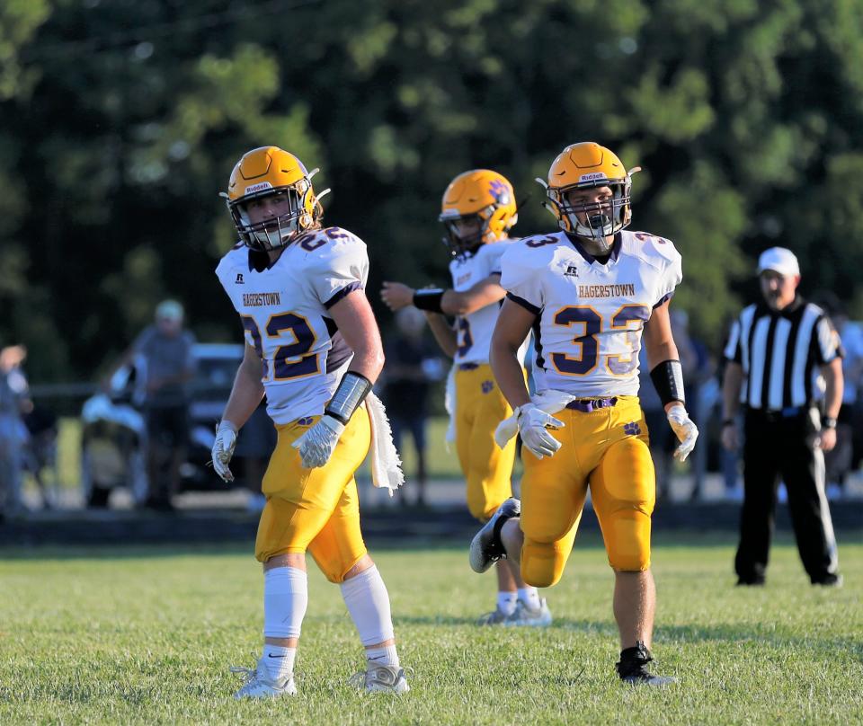 Hagerstown junior Collin Beaty (left) and freshman Aiden Grover (right) line up for a play during a game against Centerville Aug. 26, 2022.