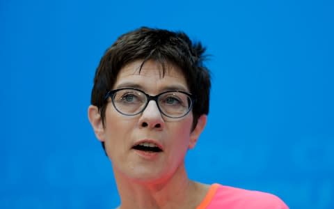  The governor of German Saarland state and designated CDU Secretary General, Annegret Kramp-Karrenbauer, addresses a news conference after a party's leaders meeting in Berlin, Germany, Monday, Feb. 19, 2018 - Credit:  AP