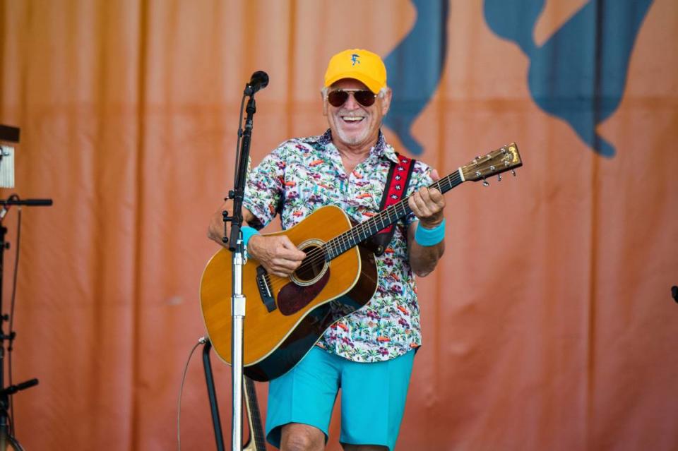 Jimmy Buffett, who died Friday at age 76, is shown performing at the New Orleans Jazz and Heritage Festival in 2018, in New Orleans, Louisiana. He was known for his island-themed music.
