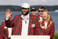 Scottie Scheffler waves after winning the weather delayed RBC Heritage golf tournament, Monday, April 22, 2024, in Hilton Head Island, S.C. (AP Photo/Chris Carlson)