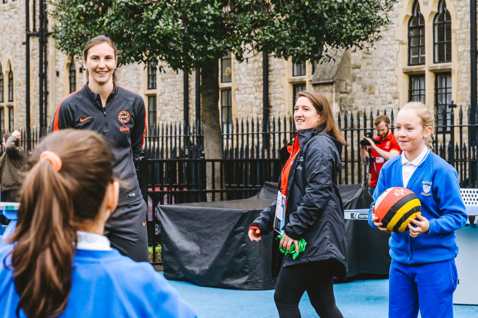 Rachel Dunn watching children play netball at the TeamUp event in Marylebone