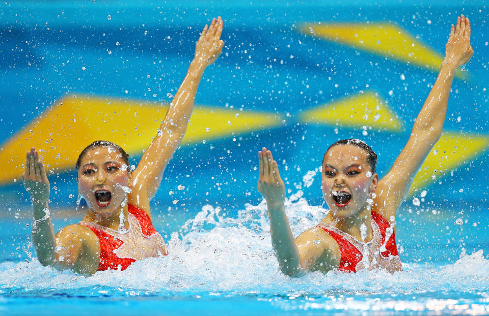 LONDON, ENGLAND - AUGUST 05: Xuechen Huang and Ou Liu of China compete in the Women's Duets Synchronised Swimming Technical Routine on Day 9 of the London 2012 Olympic Games at the Aquatics Centre on August 5, 2012 in London, England. (Photo by Al Bello/Getty Images)