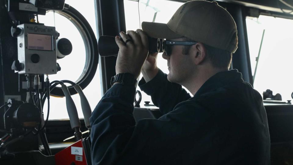 A junior officer stands watch aboard the Navy destroyer Thomas Hudner on Nov. 1, 2023 in the Red Sea. (MC2 Jordan Klineizquierdo/Navy)