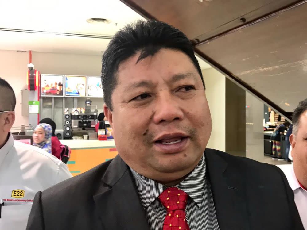 The complainant claimed to have received a telephone call from Johor Bersatu chief Mazlan Bujang (pic) ordering him to re-open the said factories.  — Picture by Ben Tan