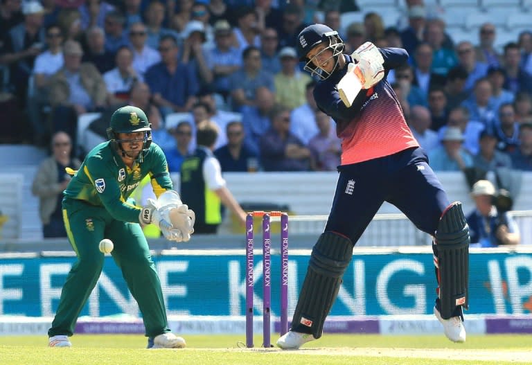 England batsman Joe Root (R) plays a shot during the first One day international between England and South Africa at Headingley in Leeds on May 24, 2017