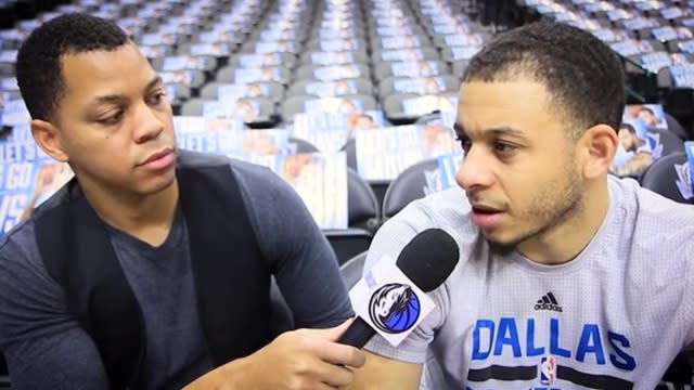 Earl K. Sneed, seen here interviewing Dallas guard Seth Curry, was a Mavs.com beat writer from the 2010-11 season through Tuesday. (Screencap via NBA.com)