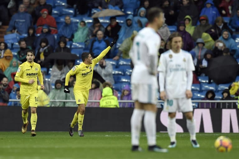 Villarreal midfielder Pablo Fornals (C) celebrates after scoring during the Spanish league football match against Real Madrid at the Santiago Bernabeu Stadium in Madrid on January 13, 2018