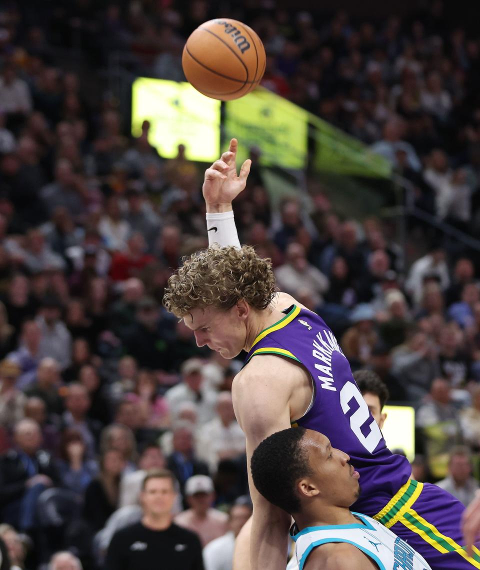 Utah Jazz forward Lauri Markkanen (23) tries to shoot over Charlotte Hornets guard Grant Williams (2) in Salt Lake City on Thursday, Feb. 22, 2024. The Hornets won 115-107. | Jeffrey D. Allred, Deseret News