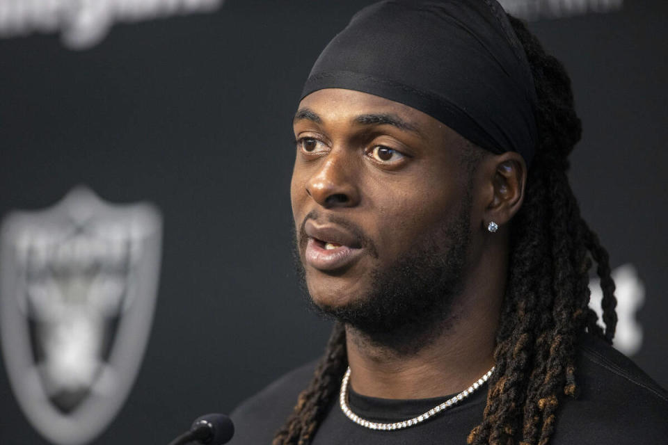 Seen here, Raiders wide receiver Davante Adams speaking to media at a press conference. 