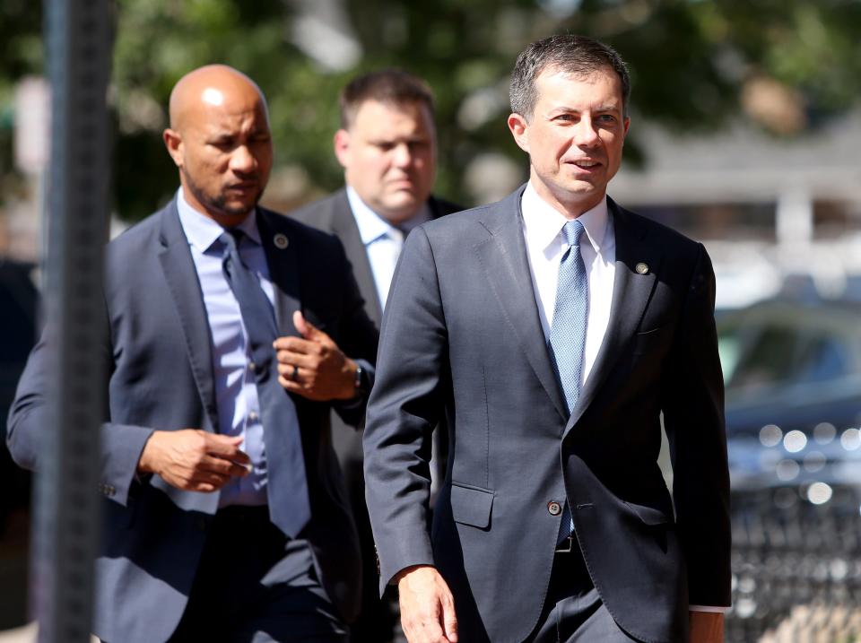 U.S. Secretary of Transportation and former South Bend mayor Pete Buttigieg, far right, and his team arrive to tour the railroad crossing at Richmond Street and Blazer Boulevard in Elkhart on Wednesday, Aug. 30, 2023, during a visit with Elkhart Mayor Rod Roberson.