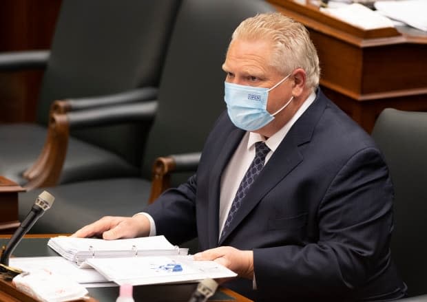 Ontario Premier Doug Ford, seen inside the legislature on Wednesday, spoke to Michigan Gov. Gretchen Whitmer about the possibility of seeing some Canadian essential workers get vaccinated for COVID-19 stateside. (Frank Gunn/The Canadian Press - image credit)