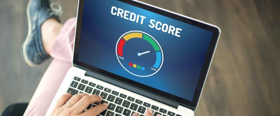 People using laptop and CREDIT SCORE concept on screen