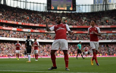 Alexandre Lacazette scores in the Emirates Cup last July - Arsenal will not be hosting their pre-season tournament this year - Credit: REUTERS/Hannah McKay