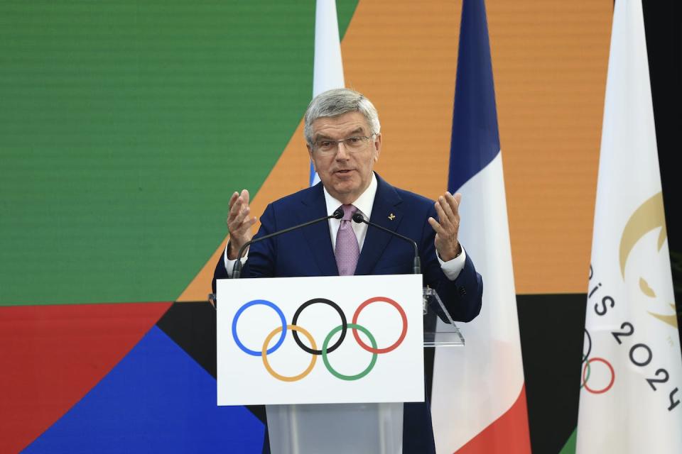 International Olympic Committee President Thomas Bach delivers a speech during the IOC invitation ceremony on July 26, 2023 in Saint-Denis, outside Paris. (AP Photo/Aurelien Morissard)