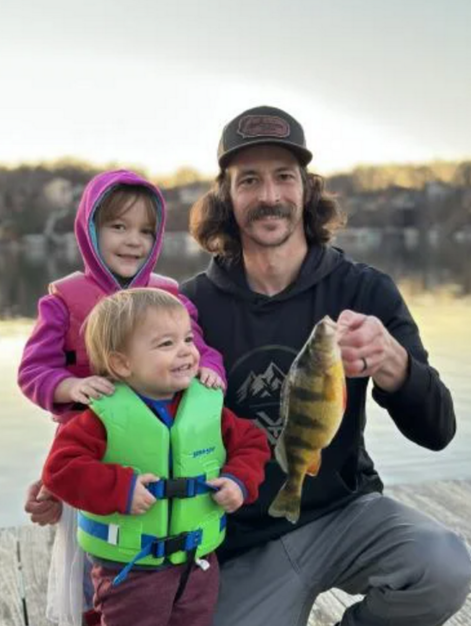 Jeffrey Needles used a throwline to catch a 12-ounce yellow perch, which trumps the state record by two ounces. “Having my kids there for that moment made it even more special,” he said.