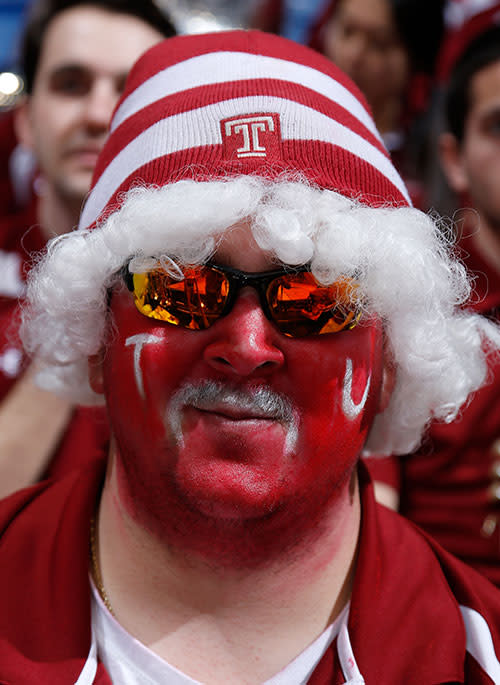 A Temple fan looks on during the NCAA tournament. (Getty)