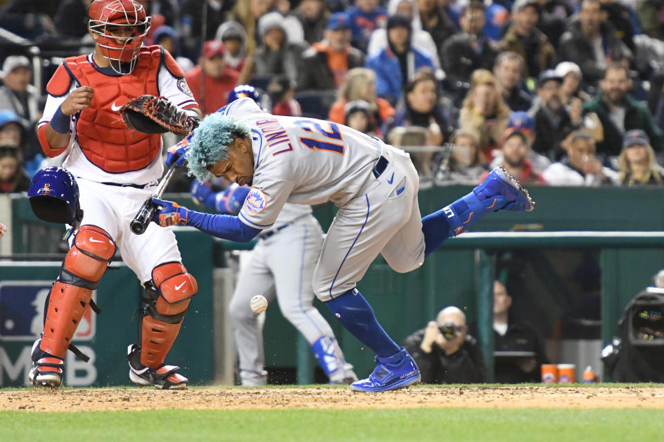 WASHINGTON, DC - APRIL 08:  Francisco Lindor #12 of the New York Mets is hit by a pitch thrown by Steve Cishek #33 of the Washington Nationals in the fifth inning by during a baseball game at the Nationals Park on April 8, 2022 in Washington, DC.  (Photo by Mitchell Layton/Getty Images)