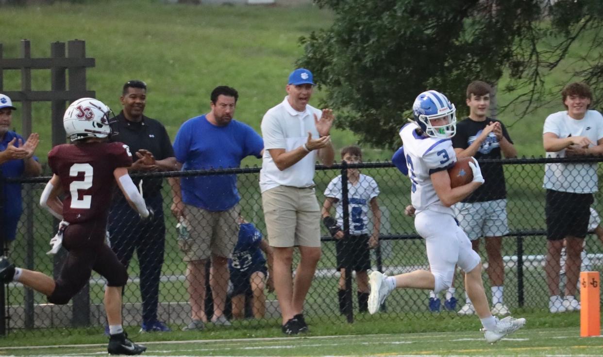 Cambridge's Keaton Kyser (3) gains points for Cambridge during the Muskies versus Bobcat football game at John Glenn High School Friday night.