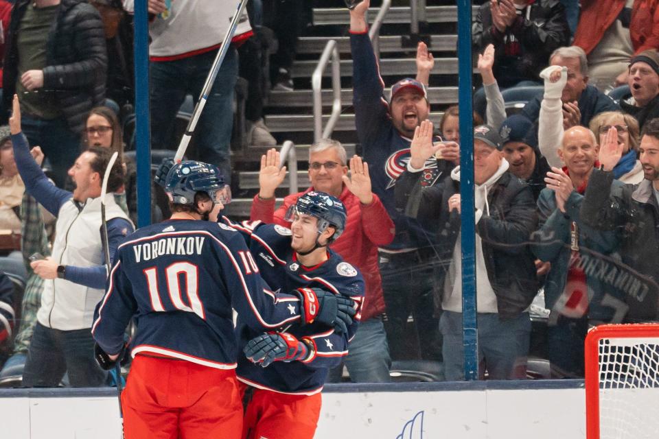 Nov 29, 2023; Columbus, Ohio, USA;
Columbus Blue Jackets left wing Dmitri Voronkov (10) celebrates with Yegor Chinakhov (59) after his goal during the second period of their game against the Montreal Canadiens on Wednesday, Nov. 29, 2023 at Nationwide Arena.