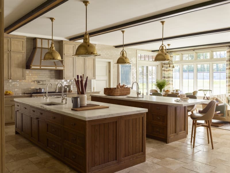 Warm-colored kitchen with double kitchen island