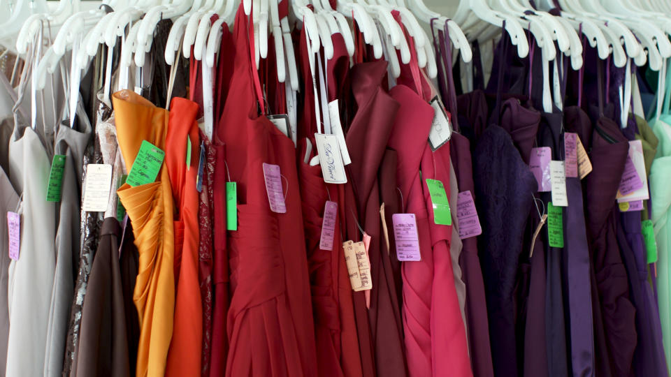 Bridesmaid dresses hanging on RK Bridal's racks. (Source: Yahoo Finance)