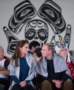 Prince William, the Duke of Cambridge, and Kate, the Duchess of Cambridge, sit together after being draped in traditional First Nation blankets during a welcoming ceremony at the Heiltsuk First Nation in the remote community of Bella Bella, B.C., on Monday September 26, 2016. THE CANADIAN PRESS/Darryl Dyck