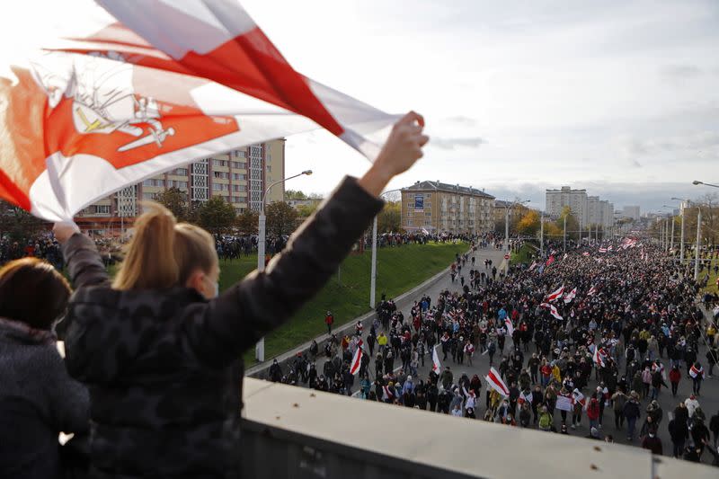 Belarusian opposition supporters hold a rally in Minsk