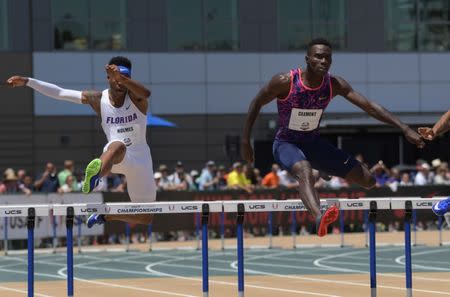 FILE PHOTO: Jun 24, 2017; Sacramento, CA, USA; T.J. Holmes of Florida (left) and Kerron Clement run in a 400m hurdles semifinal during the USA Championships at Hornet Stadium. Mandatory Credit: Kirby Lee-USA TODAY Sports