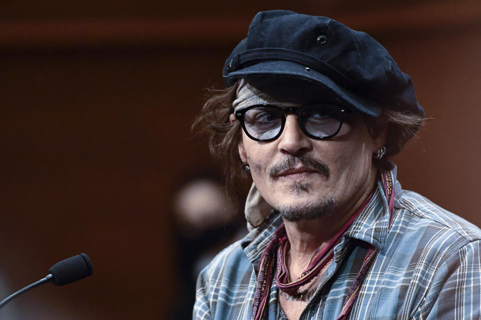 US actor Johny Deep after a photocall at the 69th San Sebastian Film Festival, in San Sebastian, northern Spain, Wednesday, Sept. 22, 2021. Johny Depp will be receiving on the night Donostia Award for his contribution to the cinema. (AP Photo/Alvaro Barrientos)