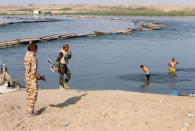 Iraqi army members are seen in Qayyarah, Iraq October 25, 2016. REUTERS/Alaa Al-Marjani