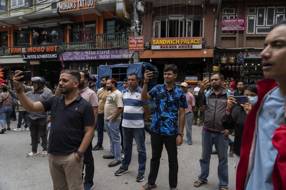 Samesex couples and LGBTQ+ activists rally in Nepal's capital during