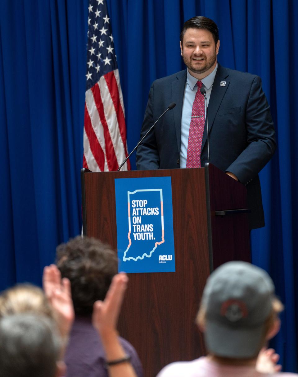 People applaud as Senator JD Ford speaks to the crowd gathering at a rally protesting lawmakers gathering to override Gov. Eric Holcomb's veto of HB1941, Tuesday, May 24, 2022 at the Indiana Statehouse in Indianapolis, Ind.  Lawmakers later overrode Gov. Eric Holcomb's veto of HB 1041, the transgender sports ban.