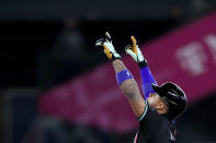 Arizona Diamondbacks' Ketel Marte points after hitting an RBI double against the Seattle Mariners during the eighth inning of a baseball game Sunday, April 28, 2024, in Seattle. (AP Photo/Lindsey Wasson)