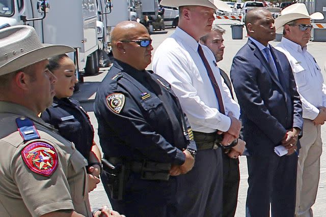 Dario Lopez-Mills/AP/Shutterstock Uvalde School Police Chief Pete Arredondo, third from left, stands during a news conference outside of the Robb Elementary school in Uvalde, Texas.