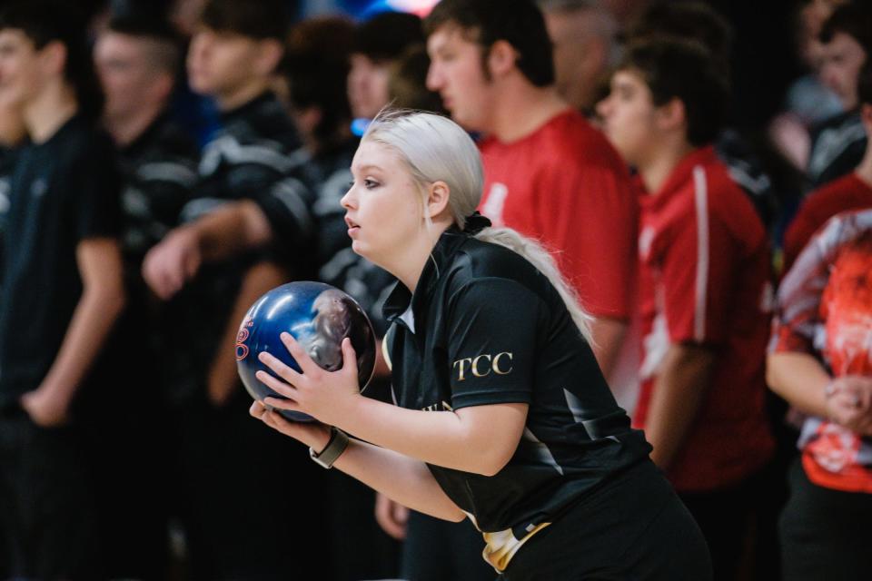 A bowler from Tuscarawas Central Catholic warms up during the Tuscarawas County Classic Saturday.