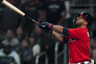 Atlanta Braves' Eddie Rosario watches his RBI sacrifice fly during the seventh inning of the team's baseball game against the New York Mets on Friday, Sept. 30, 2022, in Atlanta. (AP Photo/John Bazemore)