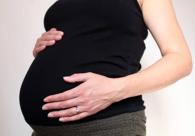 A woman eight months into her pregnancy