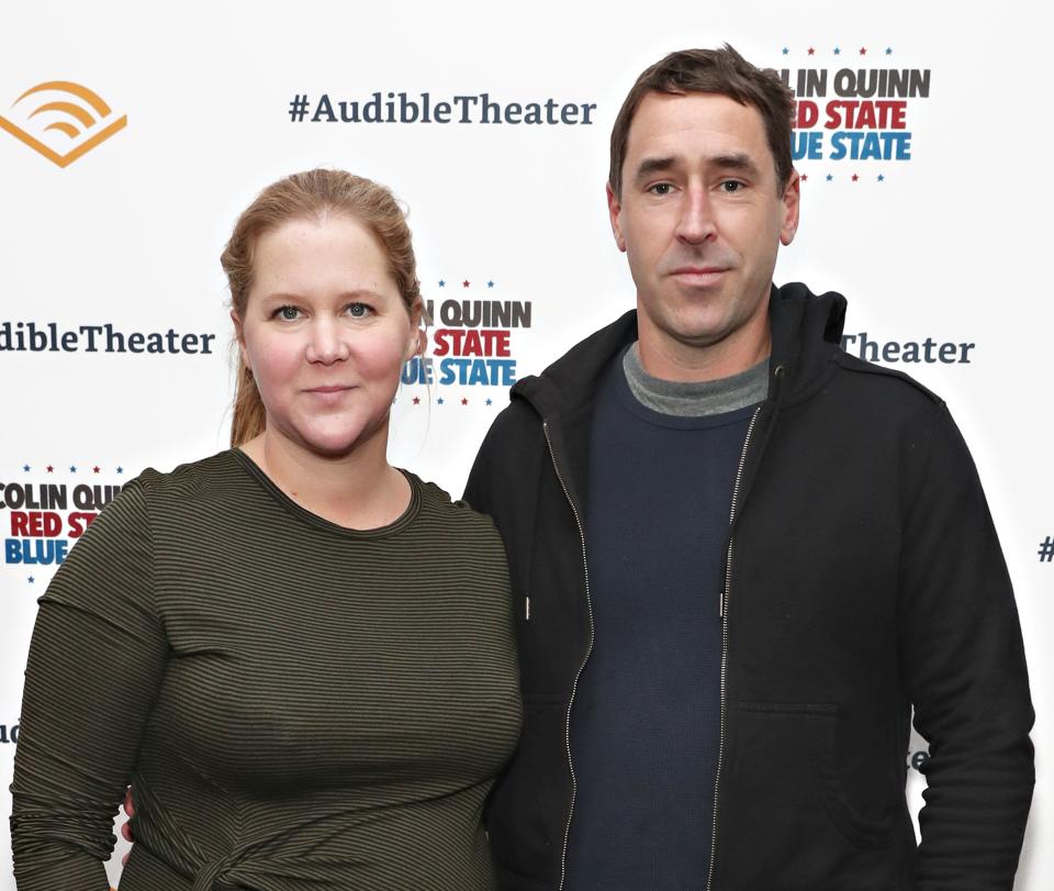 Amy Schumer and Chris Fischer attend the opening night of 'Colin Quinn: Red State Blue State' on Jan. 22 in New York City. (Photo: Cindy Ord via Getty Images)