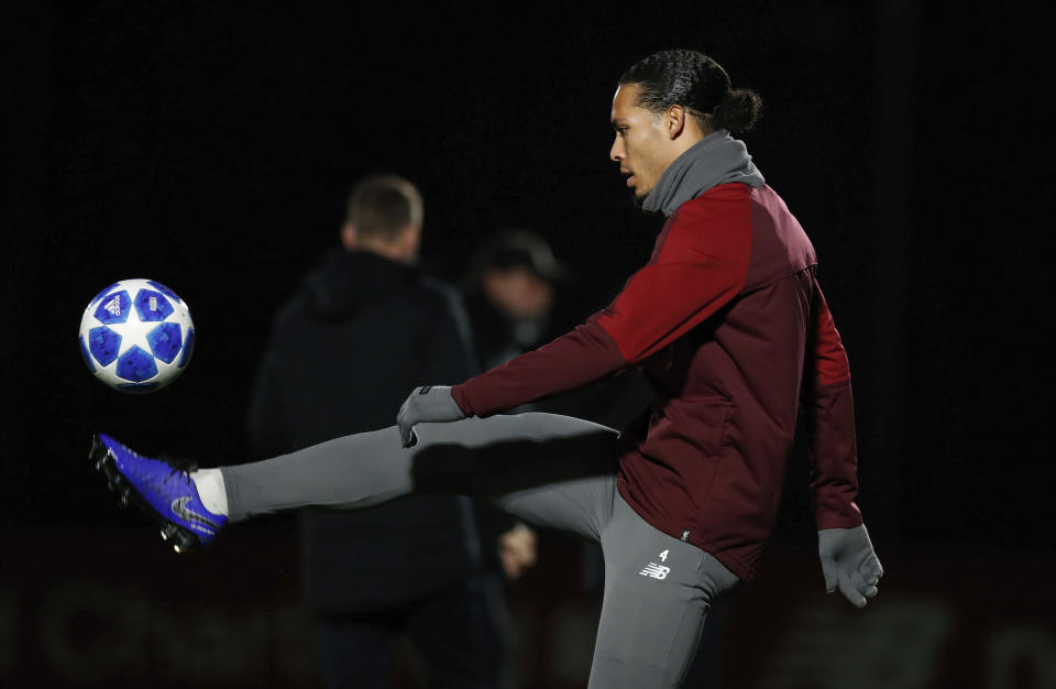 Liverpool's Virgil van Dijk controls a ball during a training session at Melwood Training Ground, Liverpool, England, Monday Dec. 10, 2018, ahead of their Champions League soccer match against Napoli on Tuesday. (Martin Rickett/PA via AP)