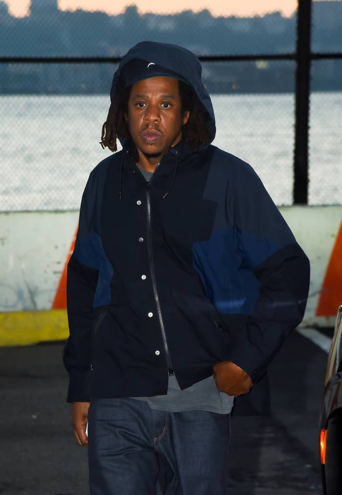 Jay-Z with his hand in his pocket