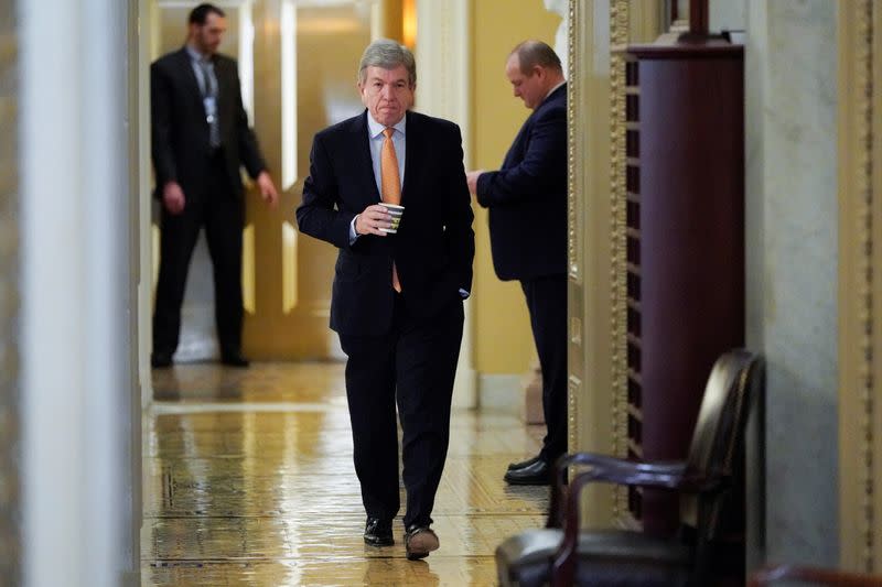 Senator Blunt walks to the Senate Chamber during a break as the Trump impeachment trial continues in Washington.