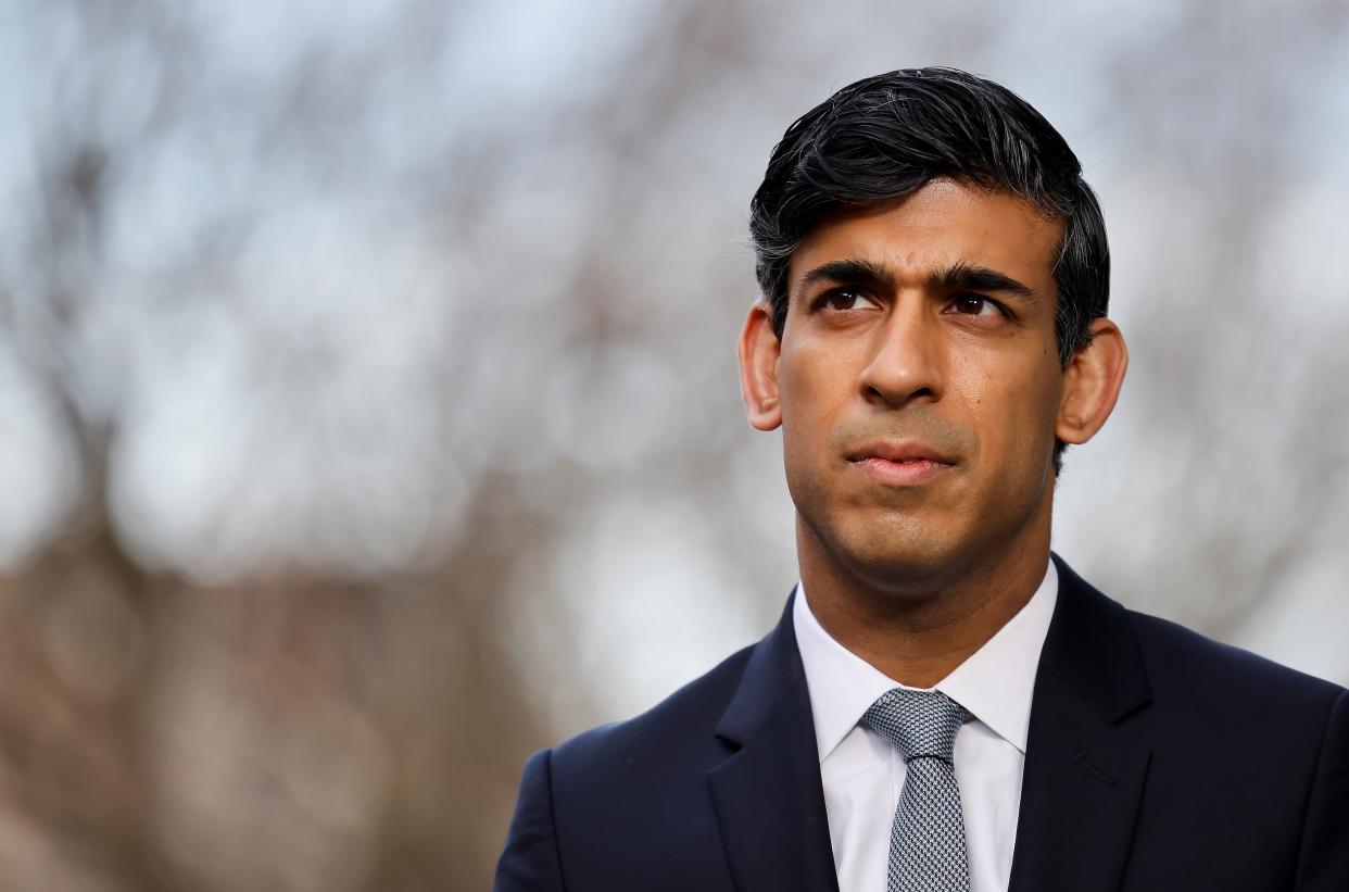 Britain's Chancellor of the Exchequer Rishi Sunak wits to give a media interview after arriving at the BBC in central London on November 22, 2020, to take appear on the BBC political programme The Andrew Marr Show. - Britain's debt is now at its highest level since 1961 as a share of GDP, after the government embarked on a massive spending spree to mitigate the economic effects of the COVID-19 coronavirus pandemic and resulting lockdowns. (Photo by Tolga Akmen / AFP) (Photo by TOLGA AKMEN/AFP via Getty Images)