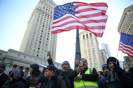 New York Yemeni Americans demonstrate in response to U.S. President Donald Trump's travel ban and recent denials of visa applications in Foley Square in lower Manhattan in New York City, New York, U.S., December 27, 2017. REUTERS/Amr Alfiky