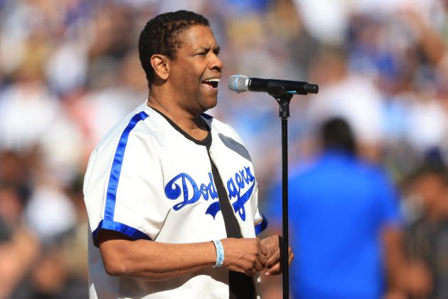 Denzel Washington leads a tribute to Jackie Robinson before the MLB All-Star Game on Tuesday at Dodgers Stadium in Los Angeles. (Photo: Sean M. Haffey via Getty Images)