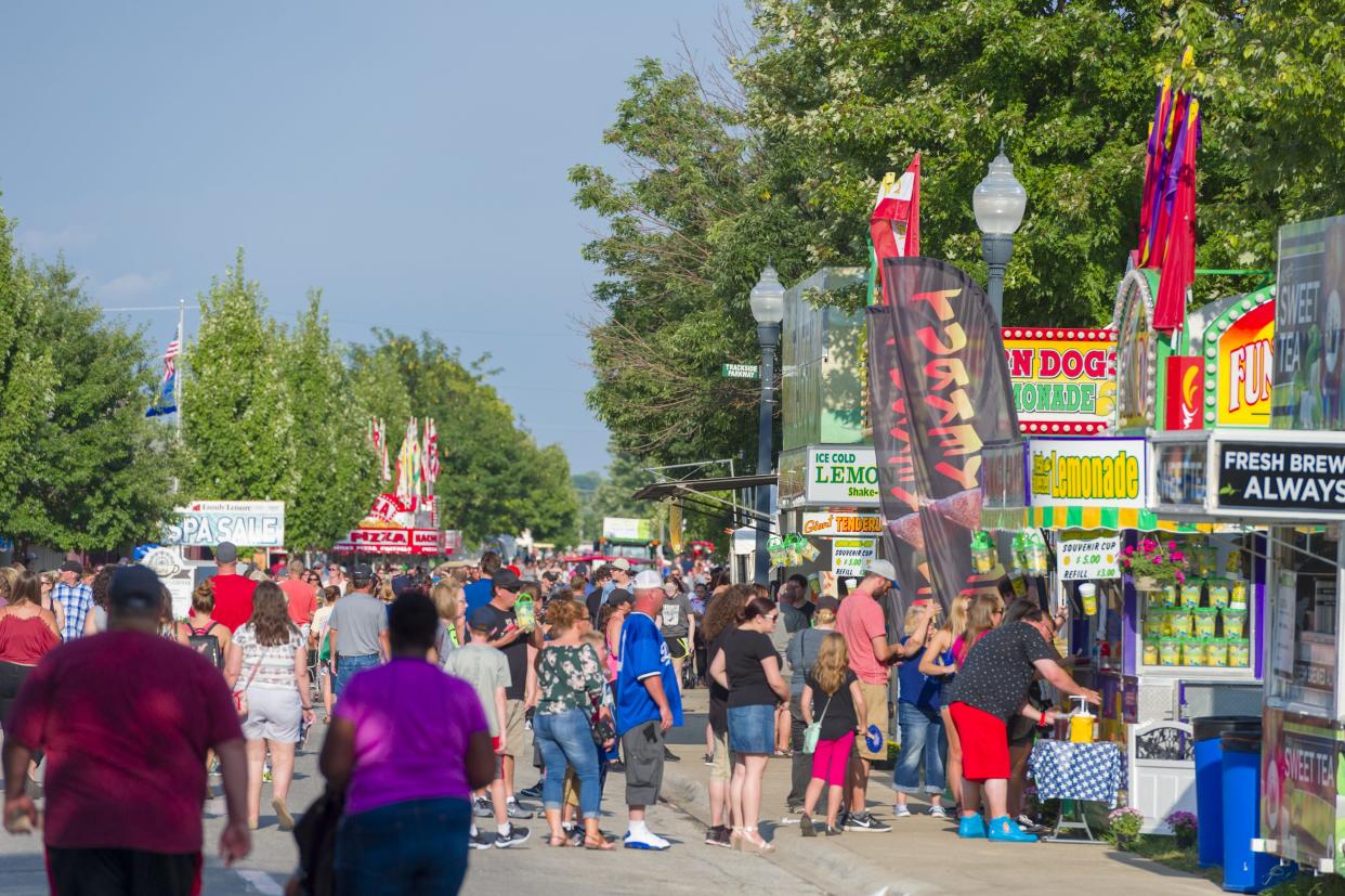 Fair-goers line up Aug. 10, 2018, at the various food vendors at the Indiana State Fair on the Chevrolet Free Stage.